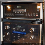 E01. McIntosh DVD player (MVP851), AV system controller (MHT200), Tuner (Model TM-1) and calibration mic (049977) with original boxes. 